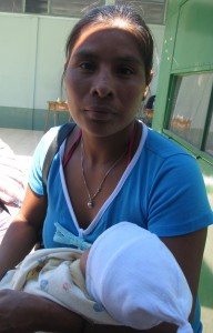 A mother brings her baby to our free health clinic.