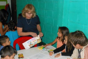 Norma Hull shares the gospel with children.